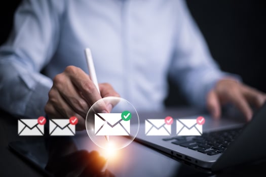 Businessman sending email by laptop computer to customer, business contact and communication, email icon, email marketing concept, send e-mail or newsletter, online working internet network. photo