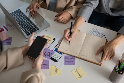 Cropped shot of a creative graphic designer team working in the office together. photo
