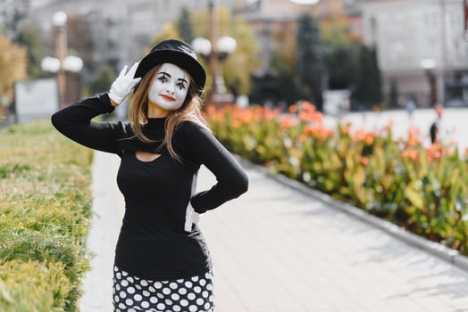 The girl with makeup of the mime. improvisation. mime shows different emotions photo