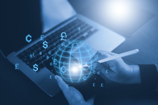 Businessman holding virtual bank with currency sign for forex exchange and global money transfer by technology concept. photo