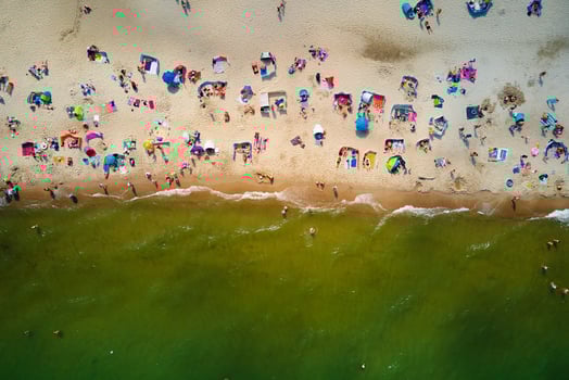 Aerial view of Baltic Sea beach with swimming people in Wladyslawowo, Poland photo