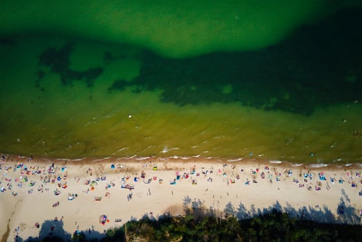 Aerial view of Baltic Sea beach with swimming people in Wladyslawowo, Poland photo