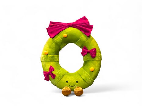 wreath doll with ribbon on white background photo