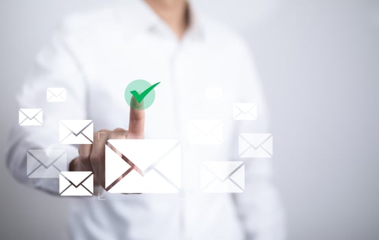 Businessman sending email by laptop computer to customer, business contact and communication, email icon, email marketing concept, send e-mail or newsletter, online working internet network. photo