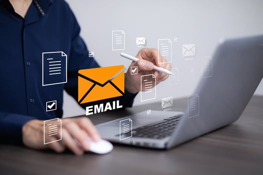 Businessman sending email by laptop computer to customer, business contact and communication, email icon, email marketing concept, send e-mail or newsletter, online working internet network. photo