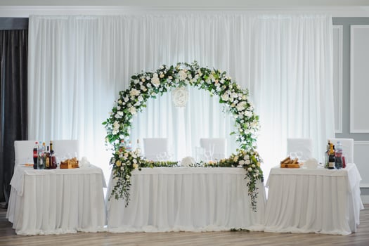 an image of tables setting at a luxury wedding hall photo
