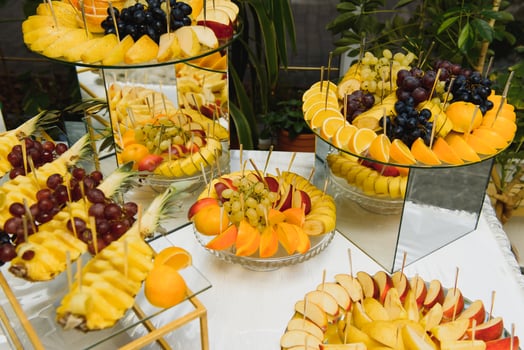 desserts with fruits, mousse, biscuits. Different types of sweet pastries, small colorful sweet cakes, macaron, and other desserts in the sweet buffet. candy bar for birthday photo