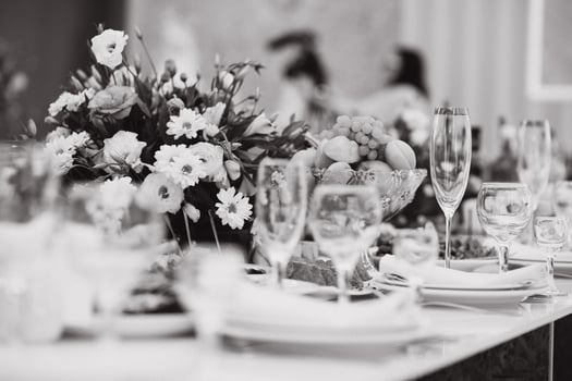 Glasses on the festive table setting. Wedding table decor concept. Table setting in classic style, setout. fine art. photo