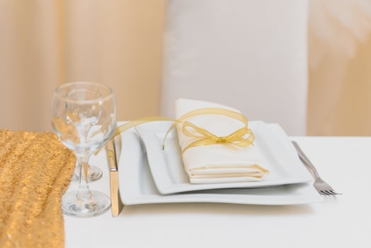 Glasses on the festive table setting. Wedding table decor concept. Table setting in classic style, setout. fine art. photo