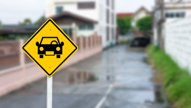 Car shape printed on yellow parking sign to show parking area photo