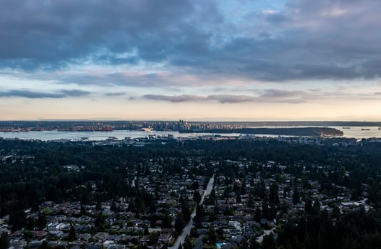 Aerial View of Vancouver Skyline and Surrounding Suburbs at Sunset photo