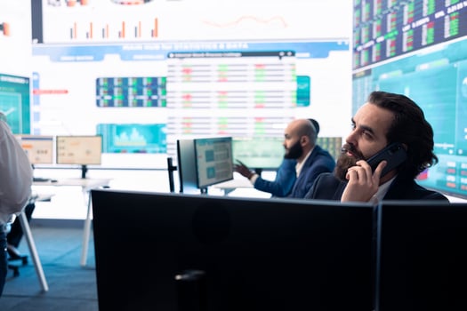 Management associate sharing insight on annual statistics during a call with the advisory board, providing initiatives to enhance operational performance metrics. Big data on a screen. photo
