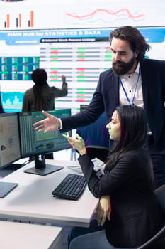 Diverse business analysts working together to evaluate costs and create a projection to deduct the future enterprise situation. Financial advisers specialists studying budget numbers. photo