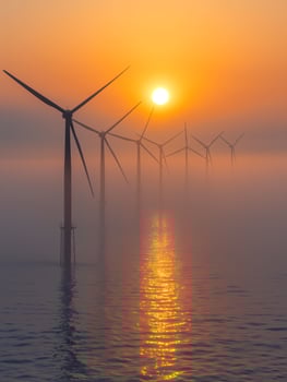 A landscape of a wind farm, symbolizing green energy and sustainability. photo