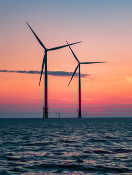 A landscape of a wind farm, symbolizing green energy and sustainability. photo