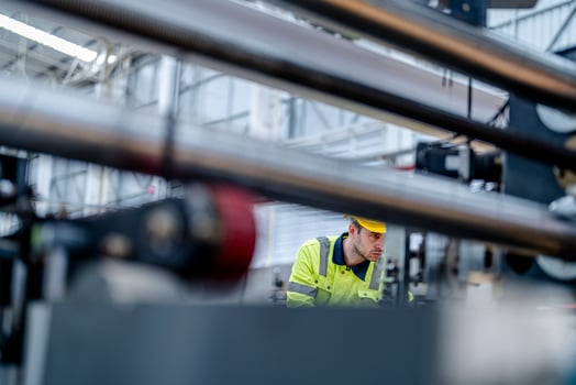 technician engineers checking the process on Heavy machine. mechanical engineering team production. Industry manufacturing. Worker holding tablet and folde. High technology production. photo