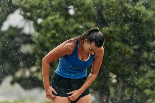 Determined Woman Athlete Preparing for Morning Run photo