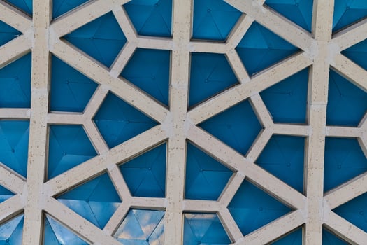 Architectural detail texture background with oriental hexagonal grid pattern photo
