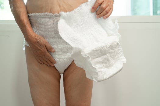 Asian senior woman patient wearing incontinence diaper in hospital, healthy strong medical. photo