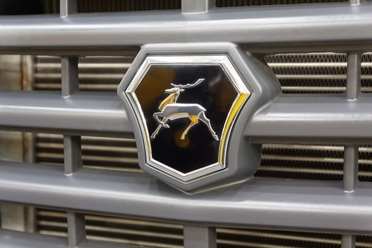 Kiyv, Ukraine - June 11, 2019. Emblem of the Russian car manufacturer GAZ in the exhibition pavilion photo