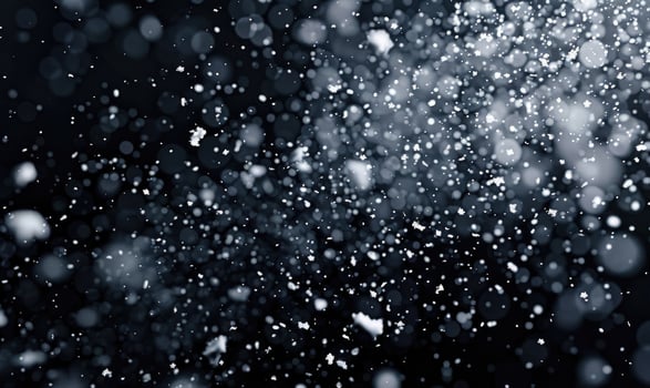 Snow explosion on black background photo