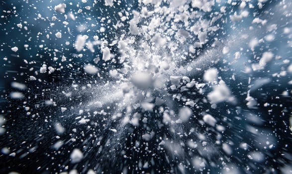 Snow explosion on black background photo