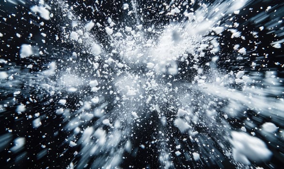 Snow explosion on black background photo