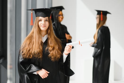 Educational theme graduating student girl in an academic gown. photo