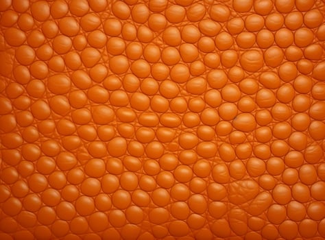 Close-up leather with a smooth, slightly uneven texture. photo