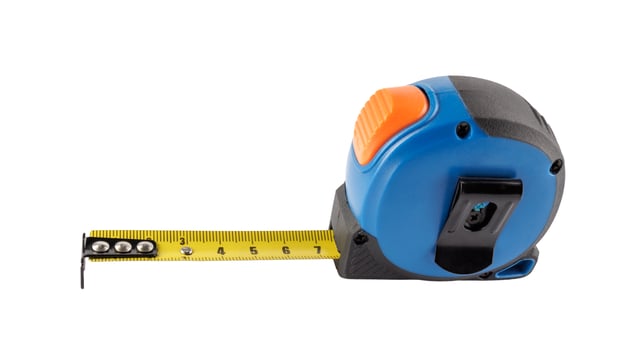 Blue measuring tape isolated on white background.Builder's tools. photo