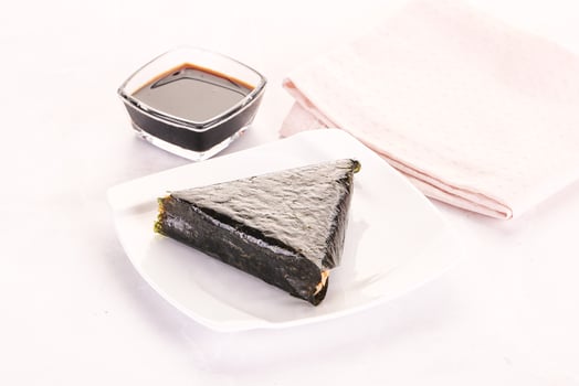 Japanese traditional onigiri with fish photo