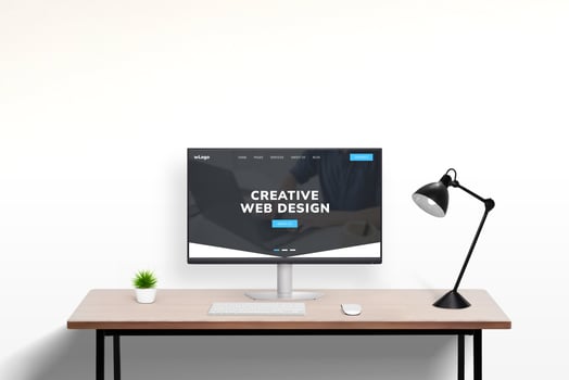 Web design studio portfolio page concept displayed on modern computer in office work desk setting. Showcase of creative digital projects and professional design work photo