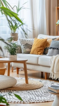 A living room with a white couch, a rug and a plant photo