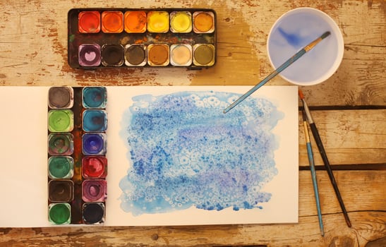 Watercolor painting with supplies photo