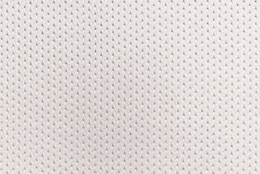 White Football Jersey Fabric Texture and Background in Sports Apparel photo