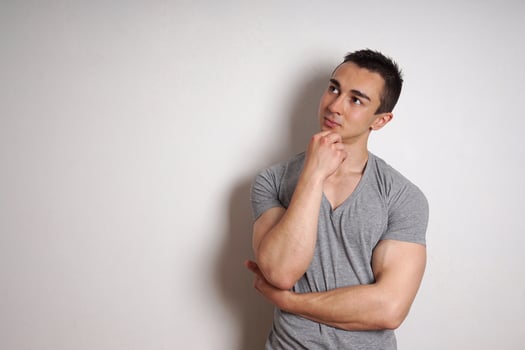 young man contemplating an idea photo