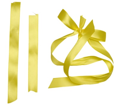 Yellow silk ribbon and bow for congratulations. Isolated background photo