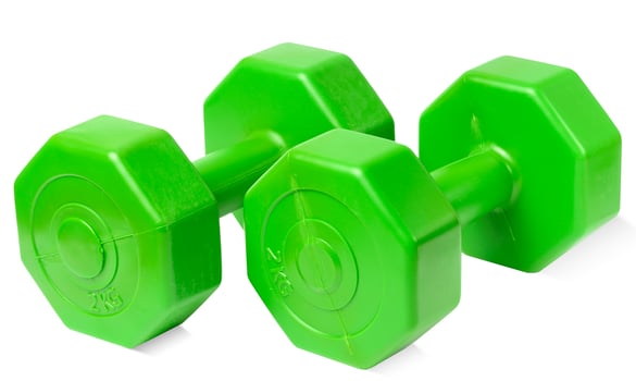Green plastic dumbbell on a white isolated background, sports equipment photo