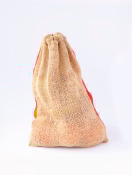 Burlap sack bag on white background photo