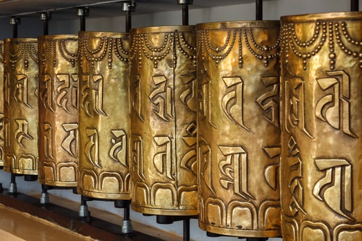 Buddhist prayer wheels photo