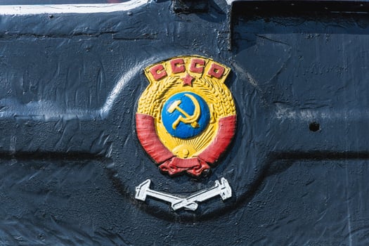 Text and numbers on a metal surface with the symbols of the USSR for design and commercial use photo