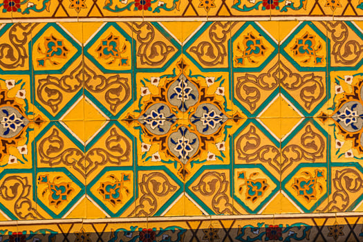 Colorful vintage surface with an old oriental pattern. The background is a texture that has a decorative value. For overlay or texture designs photo