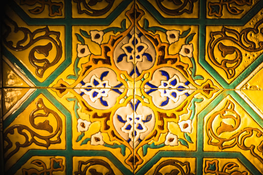 Colorful vintage surface with an old oriental pattern. The background is a texture that has a decorative value. For overlay or texture designs photo