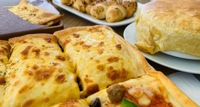 Amazing fresh homemade Italian pizza with cheese and minced meat pepperoni also sausage topping served on wooden table pizza, full cheese spread organic pizza healthy pizza photo