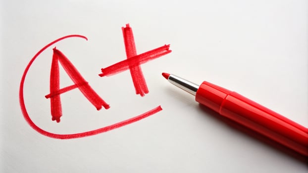 red pen a plus on paper photo