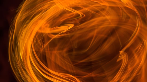 A close up of a fire ball with swirls and flames, AI photo