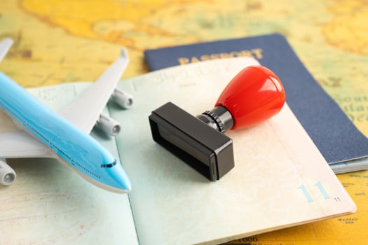 Approved Stamp visa and passport document to immigration at airport in country. photo