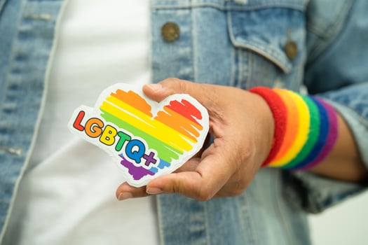 LGBT rainbow colorful flag heart and ribbon, symbol of lesbian, gay, bisexual, transgender, human rights, tolerance and peace. photo