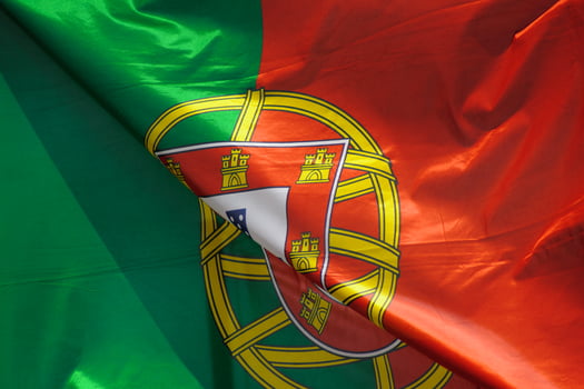close-up view of a portuguese flag waving in the wind photo