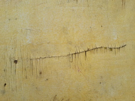 old grunge yellow wooden wall background or texture photo